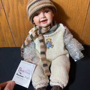 Duck House Heirloom Dolls Porcelain Baby Doll in Knit Romper with Scarf and Hat